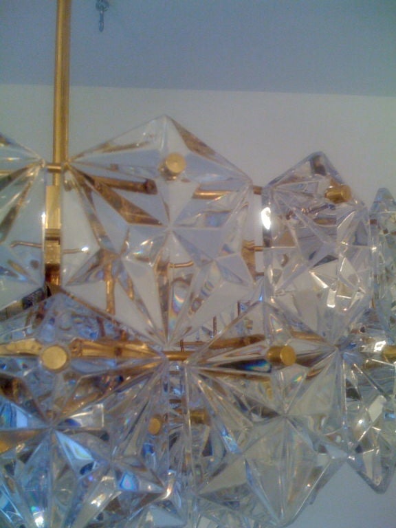 A warm 1950s Austrian Brass and cut crystal  chandelier by Kinkeldey. Eight light sources.