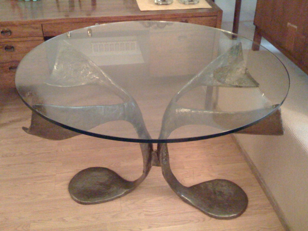 A 1960's organic design free form bronze dining/center table by French artist, Claude Victor Boeltz.