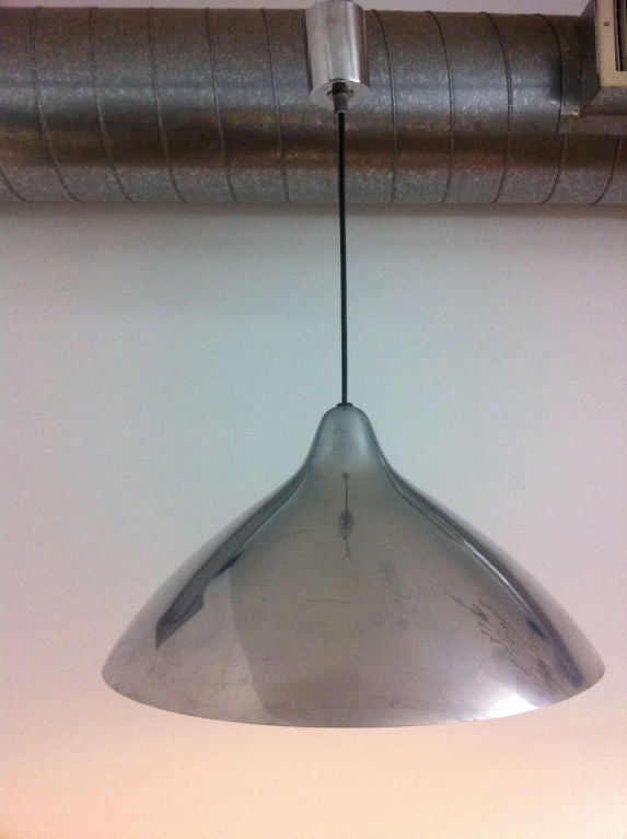 A modernist pendant light by Finnish designer, Lisa Johansson-Pape for Orno.