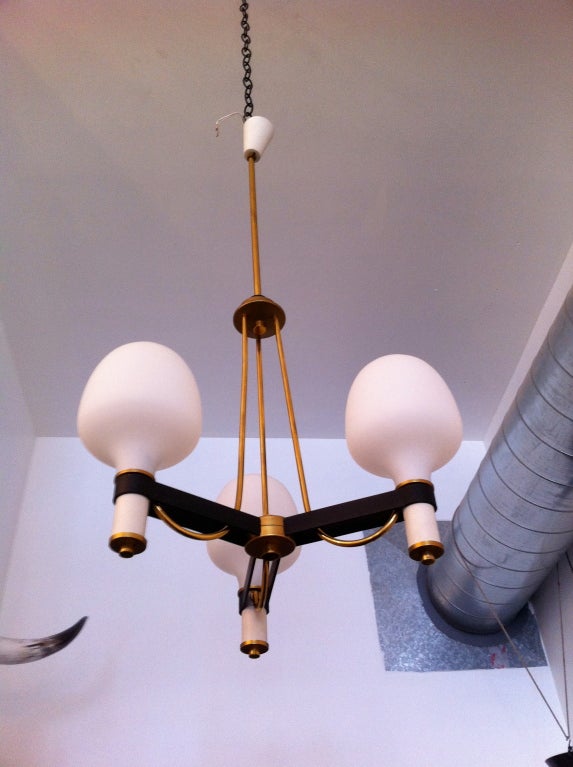 A nice 1950's brass and white glass shade Italian pendant light.