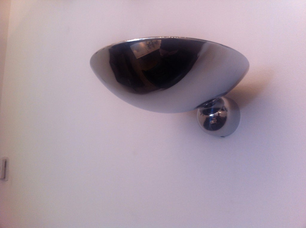 A nice modern pair of chrome 1980s, French sconces.