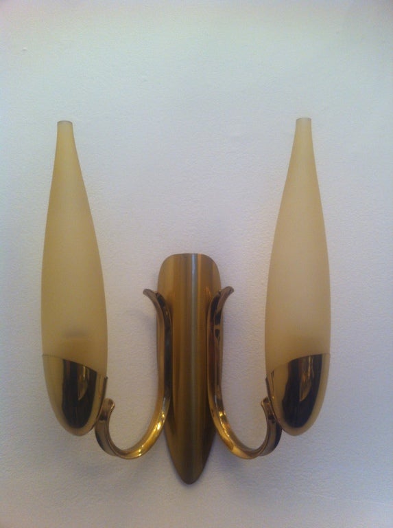 A great pair of Austrian, 1970s brass and golden glass wall lights. Matching chandelier available.