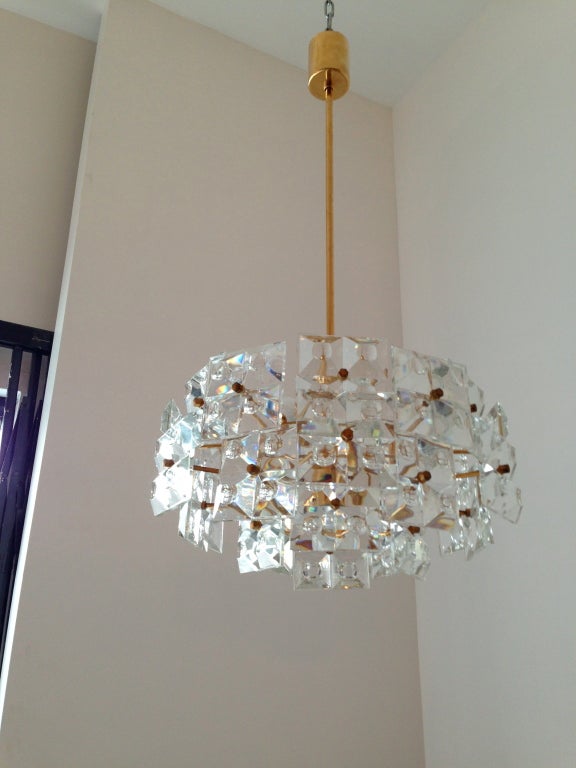A wonderful heavy cut crystal chandelier by the famed Austrian maker, Kinkeldey. Original label. 33