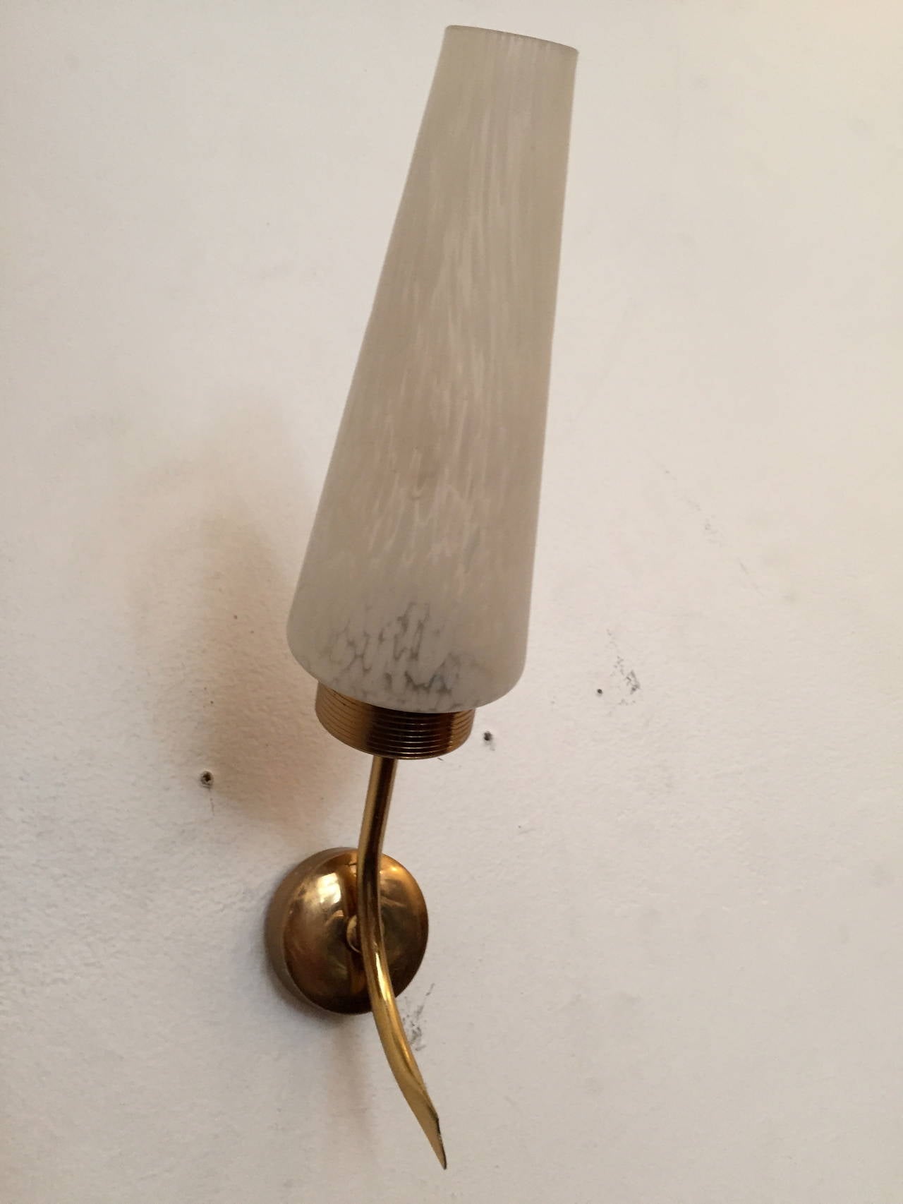 A great pair of 1950s French polished brass sconces with white cloud glass tube shades. Rewired.