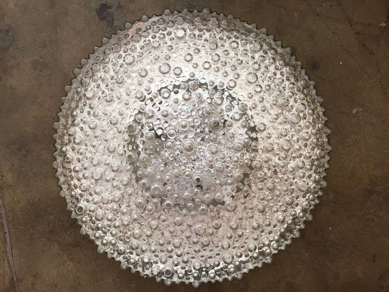 A rare Mid-Century large size flush bubbled glass ceiling light by the famed, Limburg Company. The textured bubbled glass and silvered back create a wonderful 