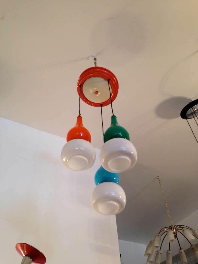 A fun 1950s Italian handblown three-light pendant chandelier by the famed glass company, Vistosi. Three colored and three white glass shades. Rewired.