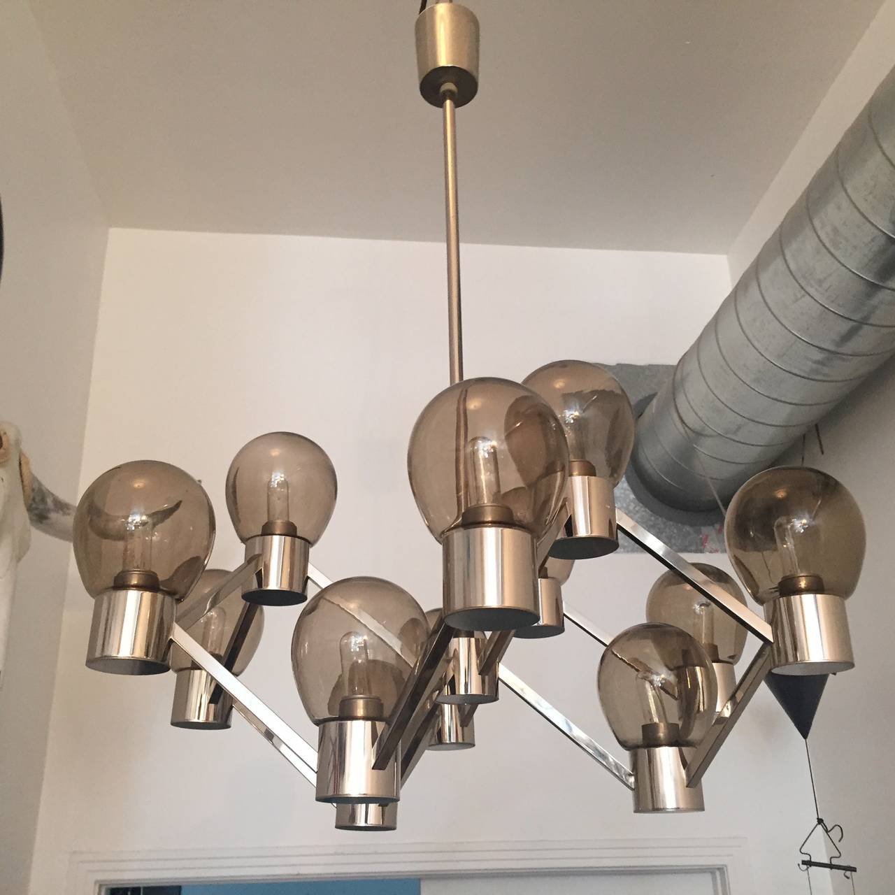 A great 1970s German polished chrome Space Age fixture with handblown smoked glass shades. Rewired.