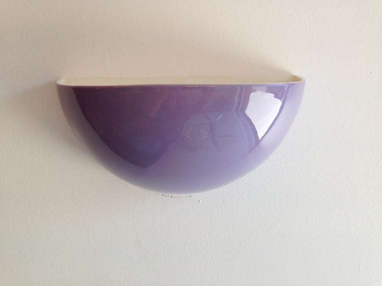 An amazing pair of Italian purple ceramic 1980s wall lights made for the noted American lighting company, Feldman Lighting of Los Angeles. Rewired.