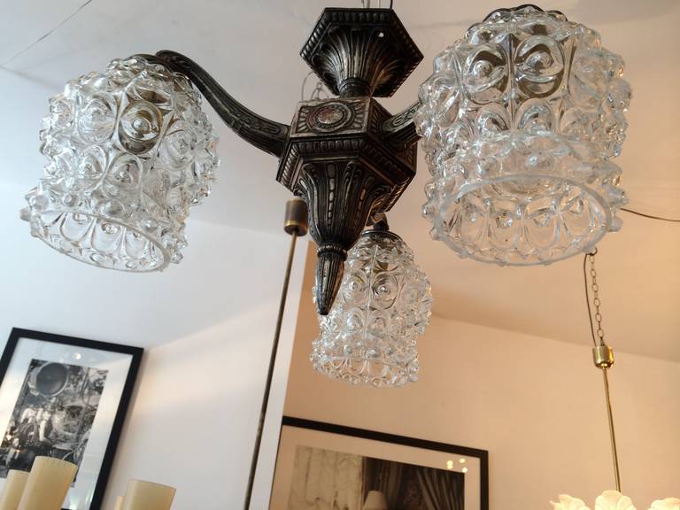A silvered bronze 1920s flush French ceiling light with clear decorative glass shades. Rewired.