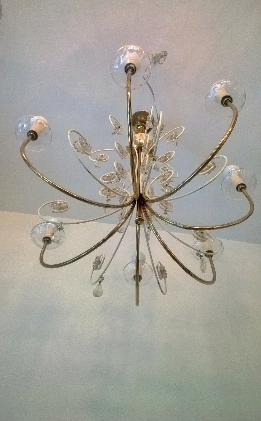 A wonderful rare 1950s Austrian crystal, polished brass, and white enamel chandelier by Emil Stejnar for Rupert Nikoll . Rewired. The ceiling pole can be lengthened if needed.