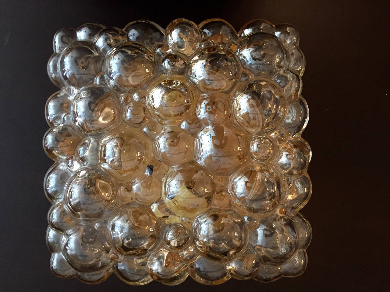 A 1960s light amber bubble square glass flush light by Limburg glass. Rewired two light sources. Matching wall lights available.