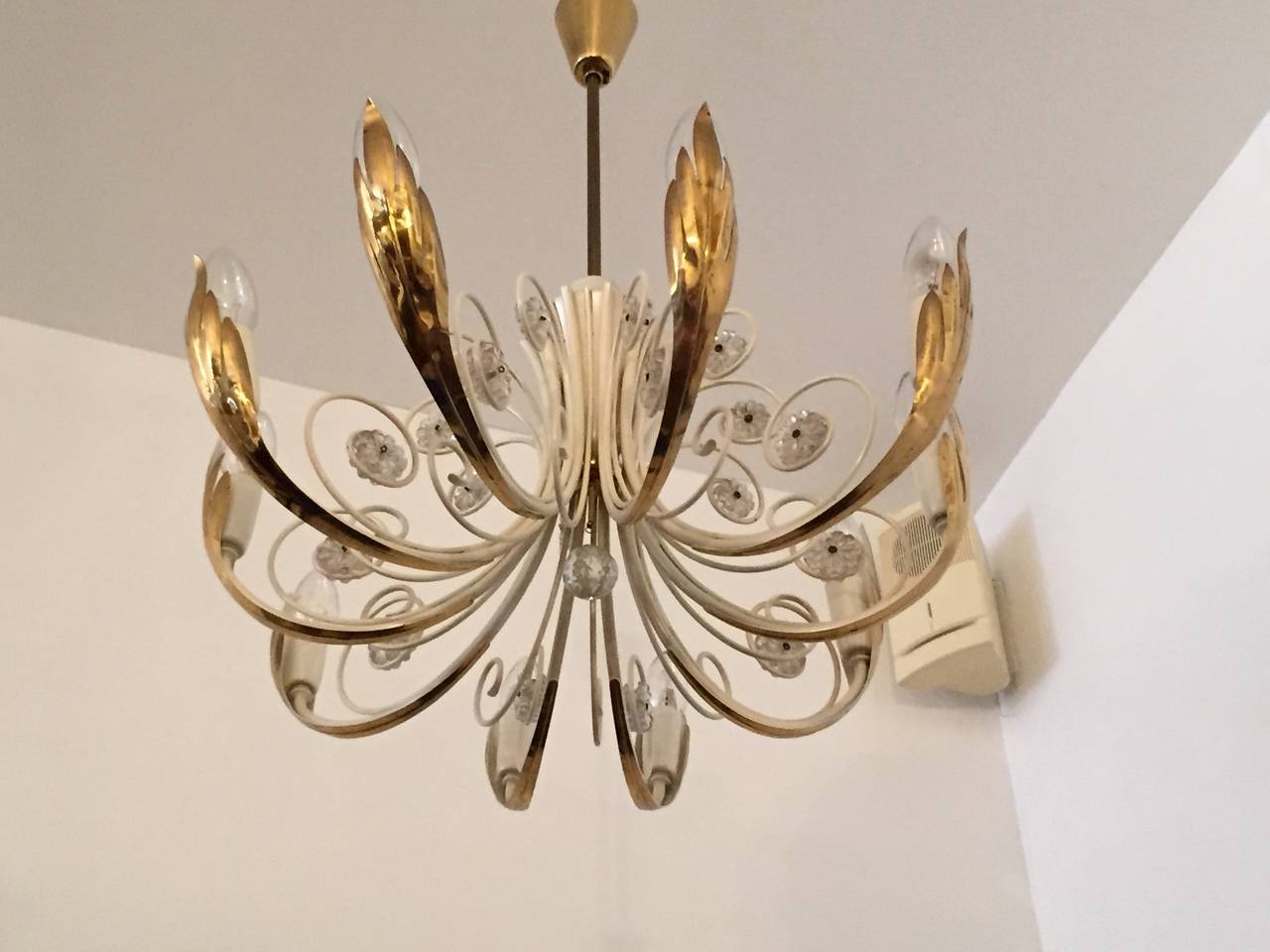 A wonderful original Austrian 1950s 10 light polished brass and white enamel chandelier by Emil Stejnar for Rupert Nikoll. Rewired.