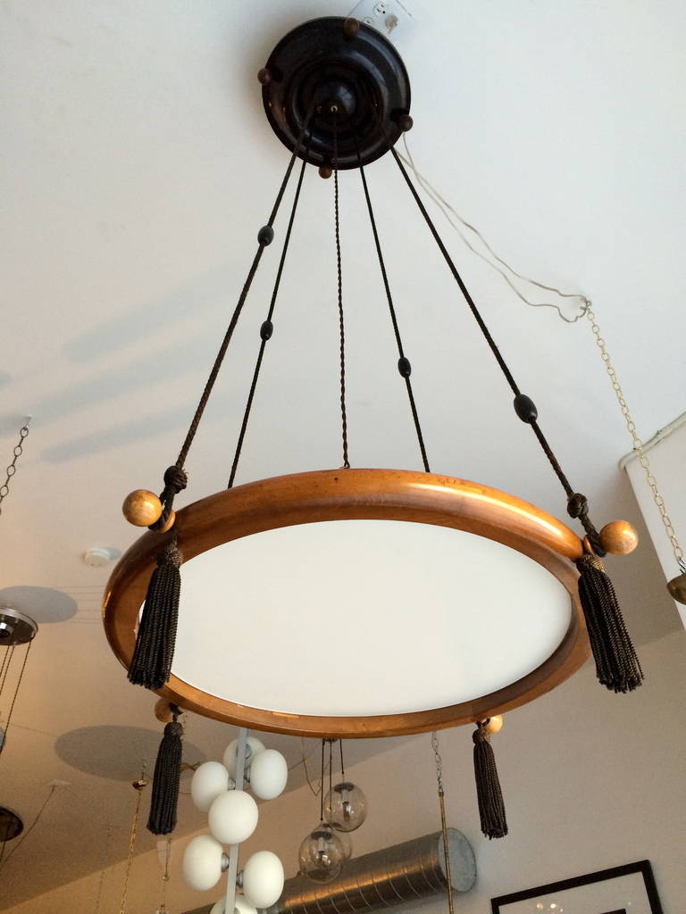 A wonderful original 1910 hanging Austrian light from an old Viennese coffee house. Restored and rewired. Three light sources, 360 watts.