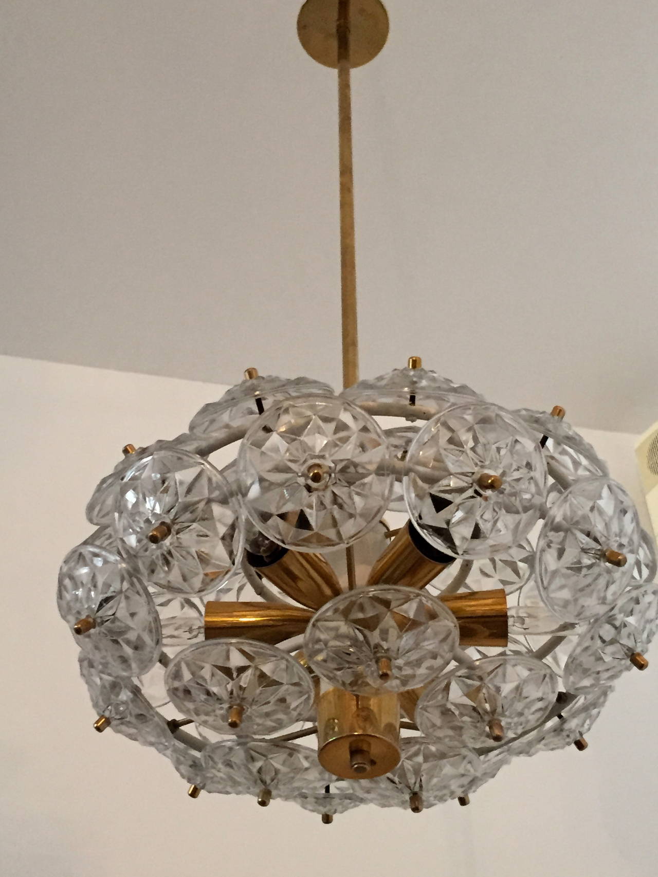 A great pair of 1960s Austrian glass pendants by Kindeldey. Rewired. 6 ea. candelabra bulbs, 25 - 40 watts. 240 watt max. We can place them on a matching decorative chain if needed.