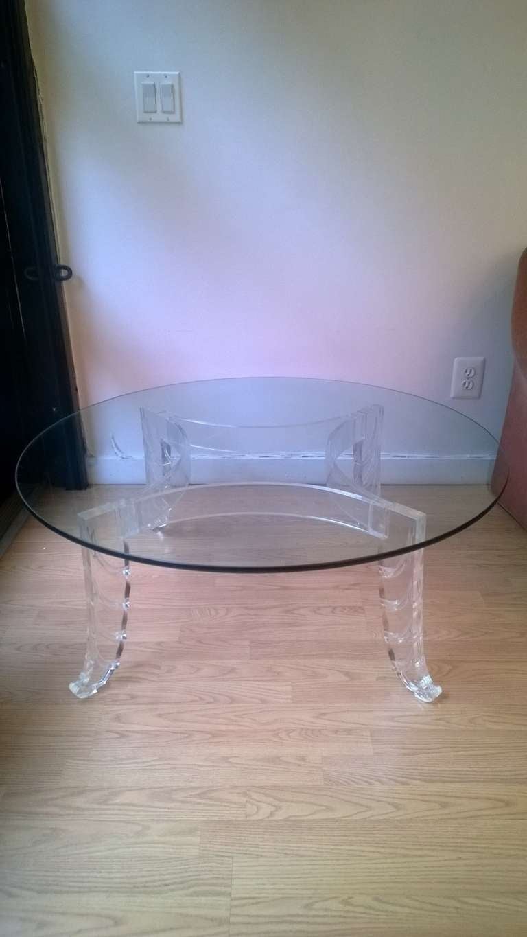 A 1940s carved Lucite coffee table designed by Lorin Jackson for Grosfeld House.