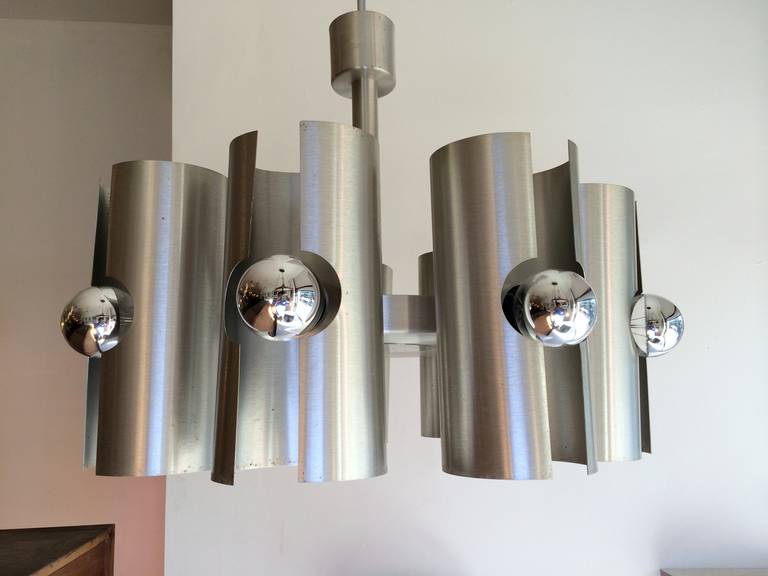 A sleek Space Age 1960s French nine-light pendant in brushed silver finish. Rewired.