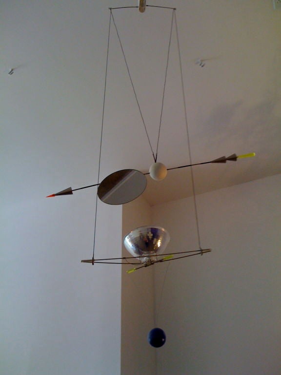 A rare low voltage kinetic light sculpture by Ingo Maurer.