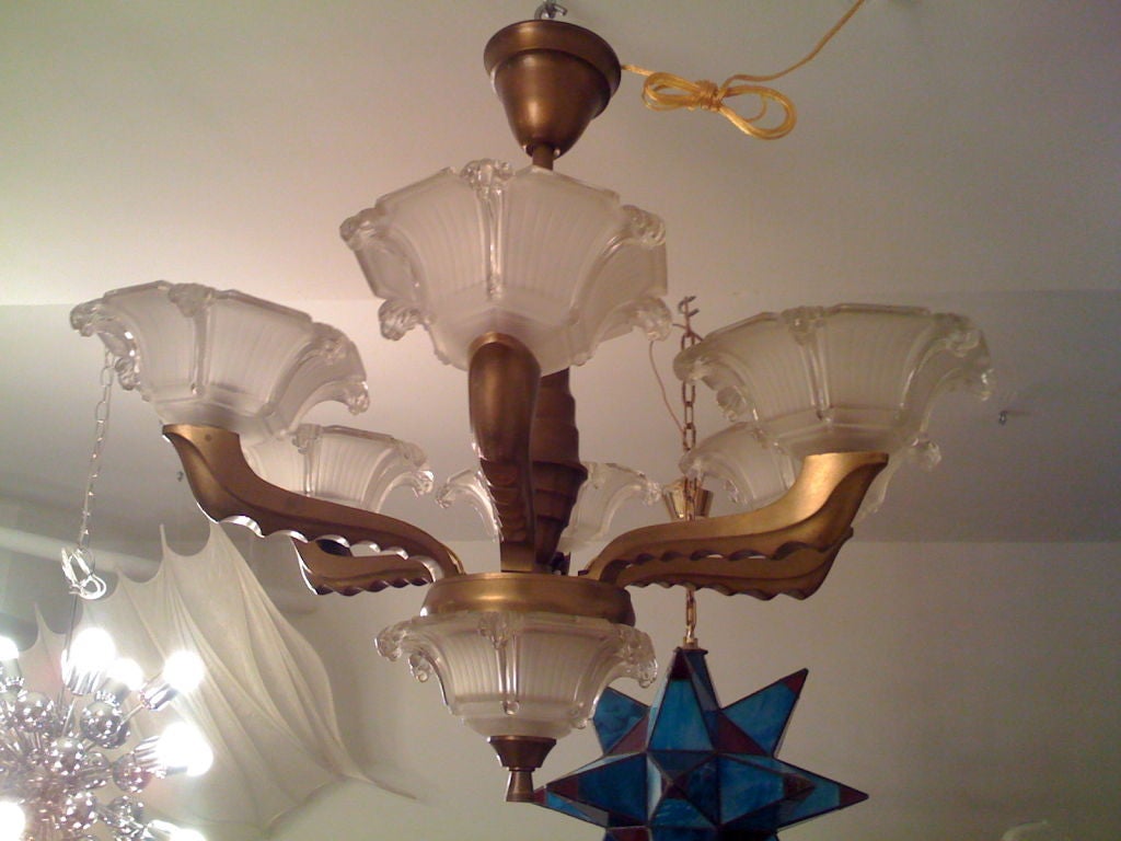 A wonderful six-arm bronze and French glass chandelier.
