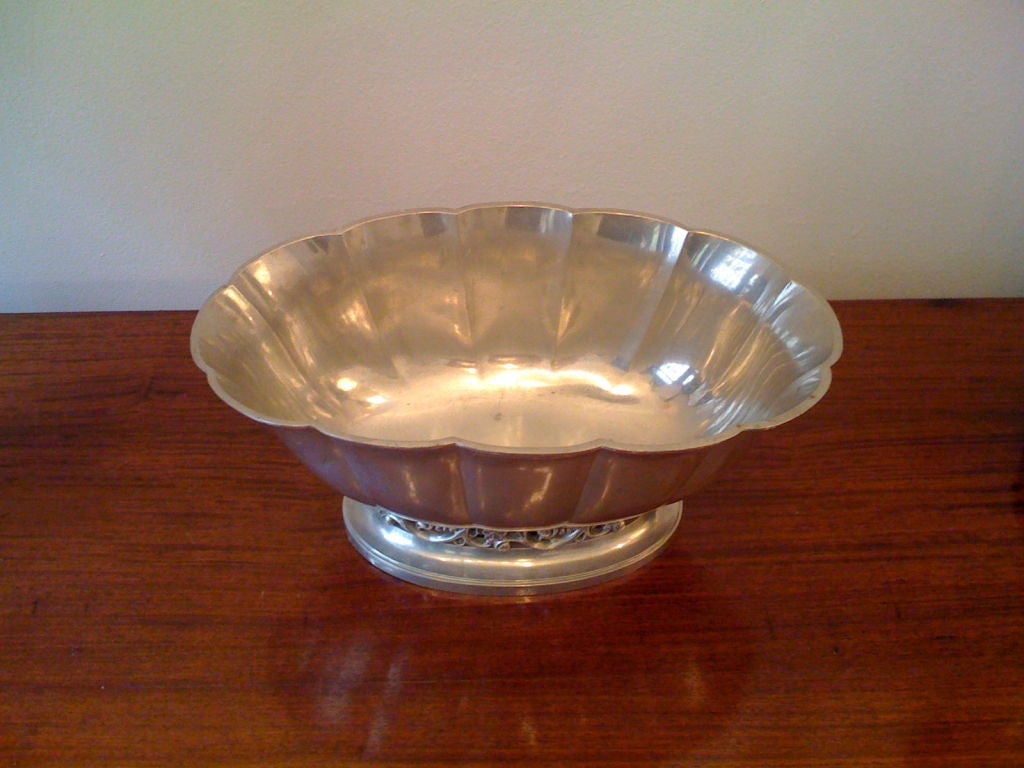 A large fluted  decorative pewter bowl by famed Danish craftsman, Just Andersen.Signed.