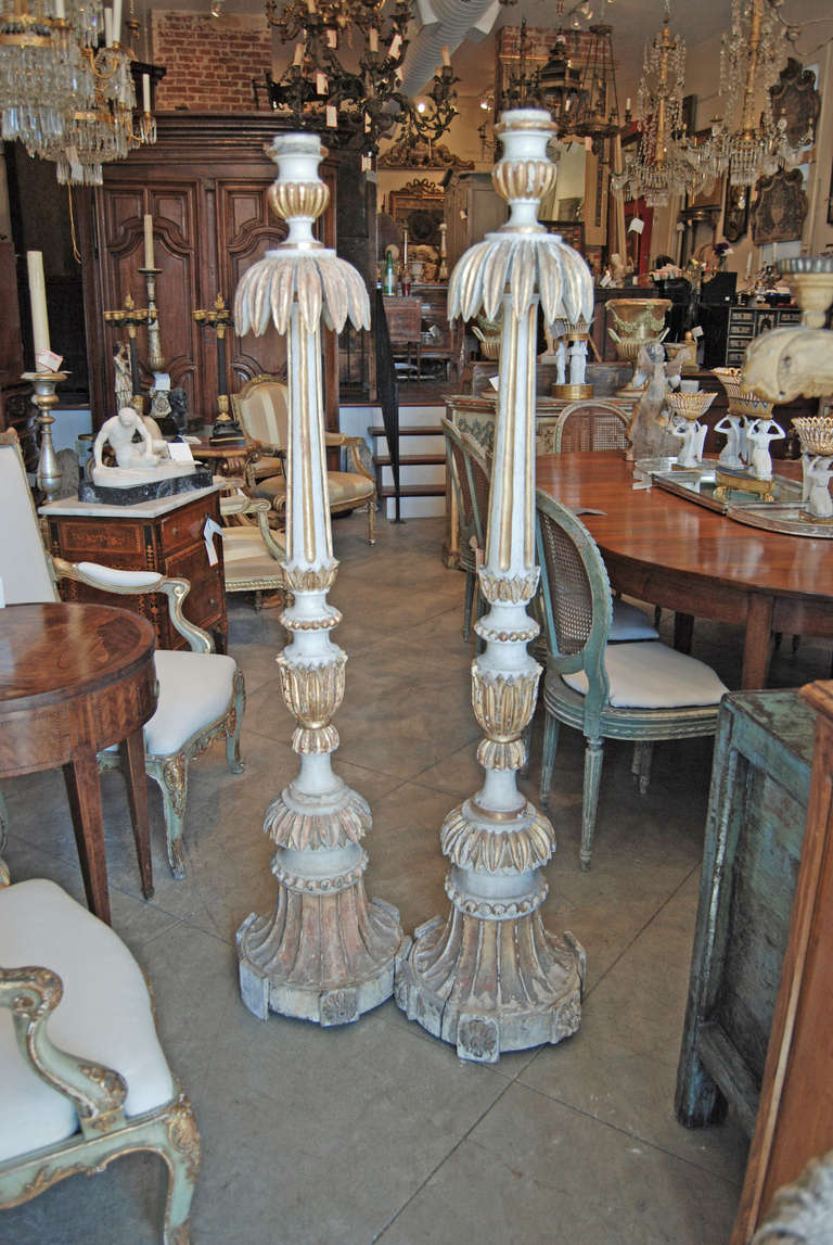 Pair of 18th Century Carved and Gilded Italian Torcheres In Fair Condition For Sale In New Orleans, LA