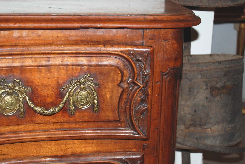 Beautifully carved 18th century walnut commode.