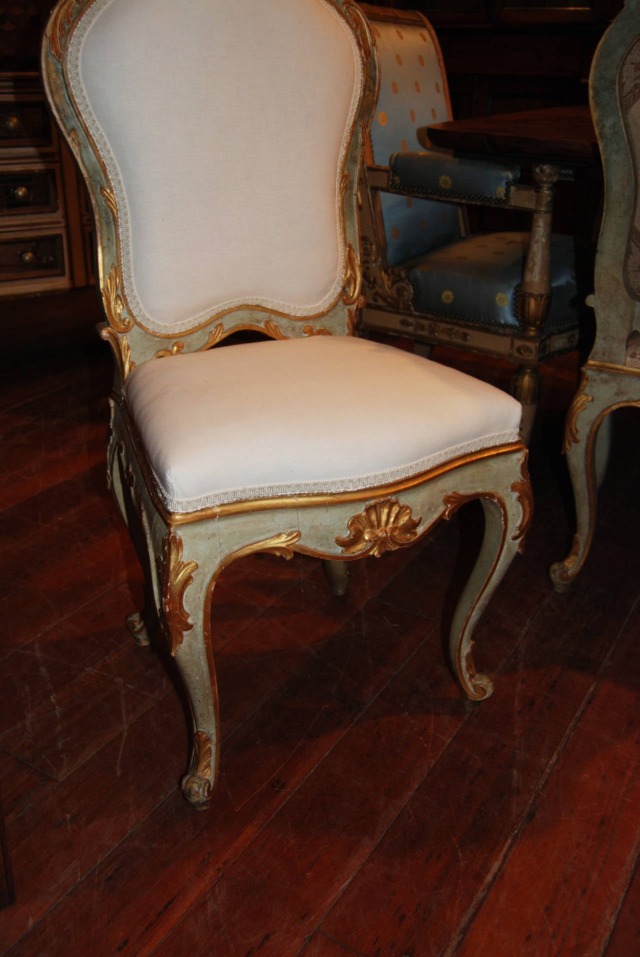 Set of 8 Carved,Gilded and Painted Italian Chairs