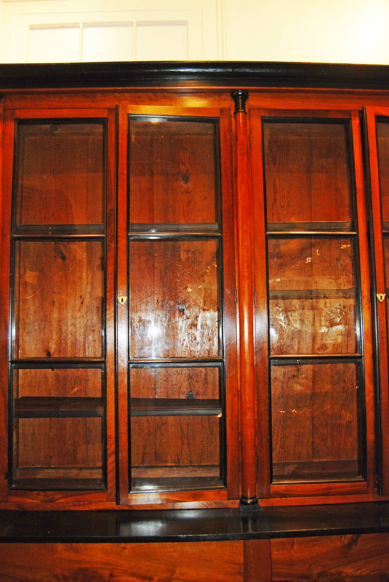 One Walnut and Ebony Italian Directoire Bookcase with Original Glass