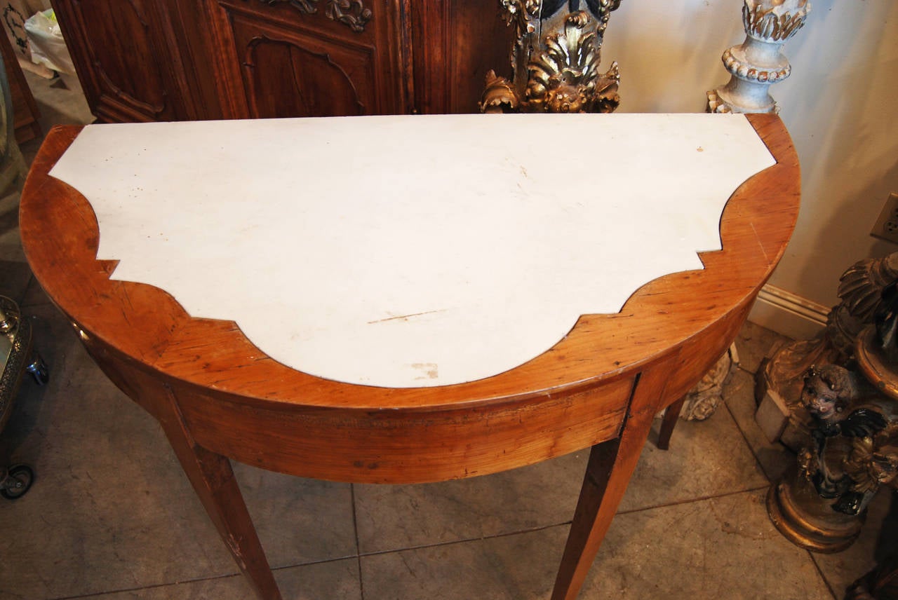 Exceptional Italian walnut or marble demilune console.