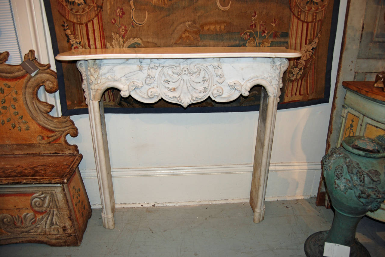 Beautifully carved 18th century Carrara marble mantel.
Opening measurements:
39.5 W.
34.75 H.