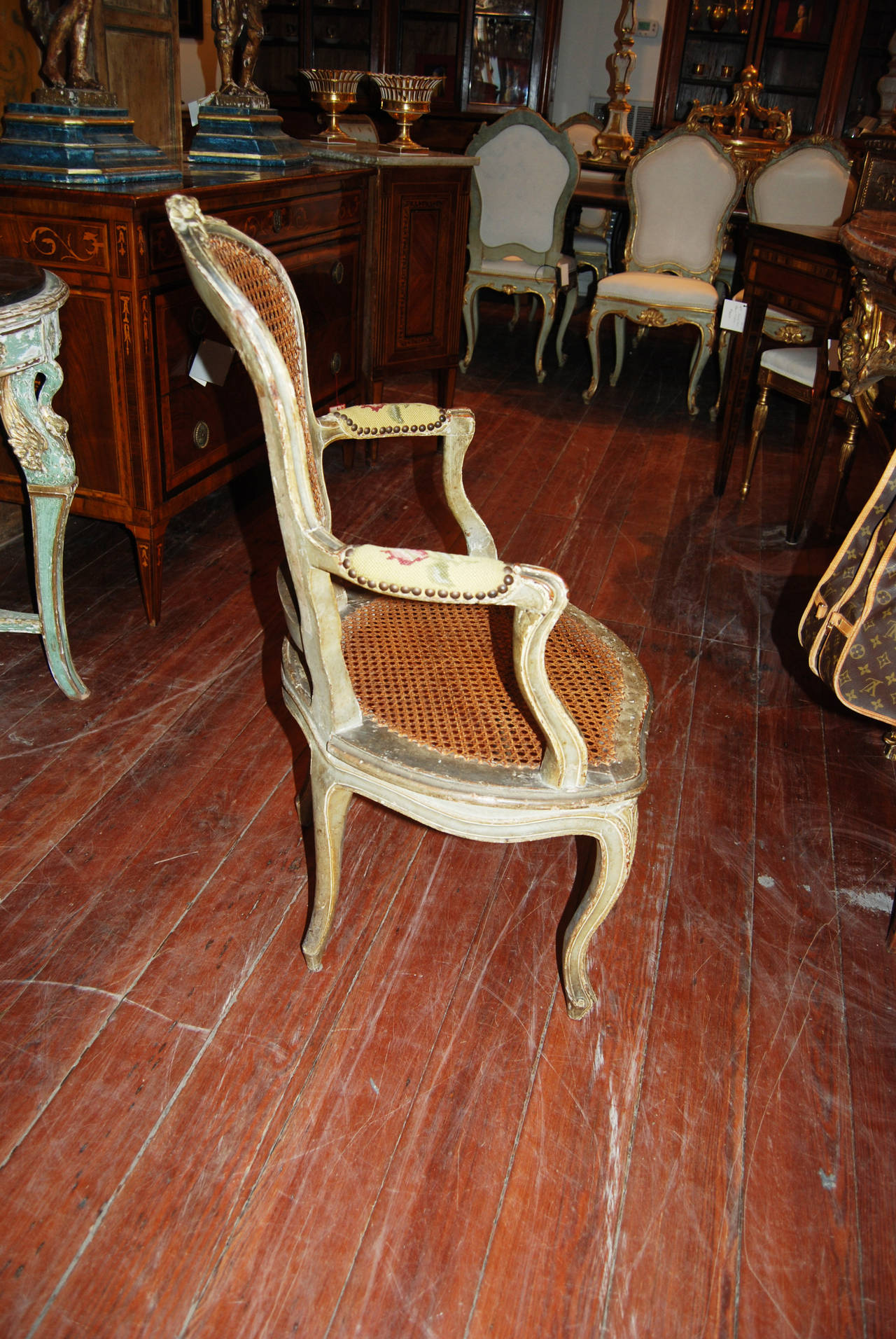 Pair of painted and carved 18th century armchairs.