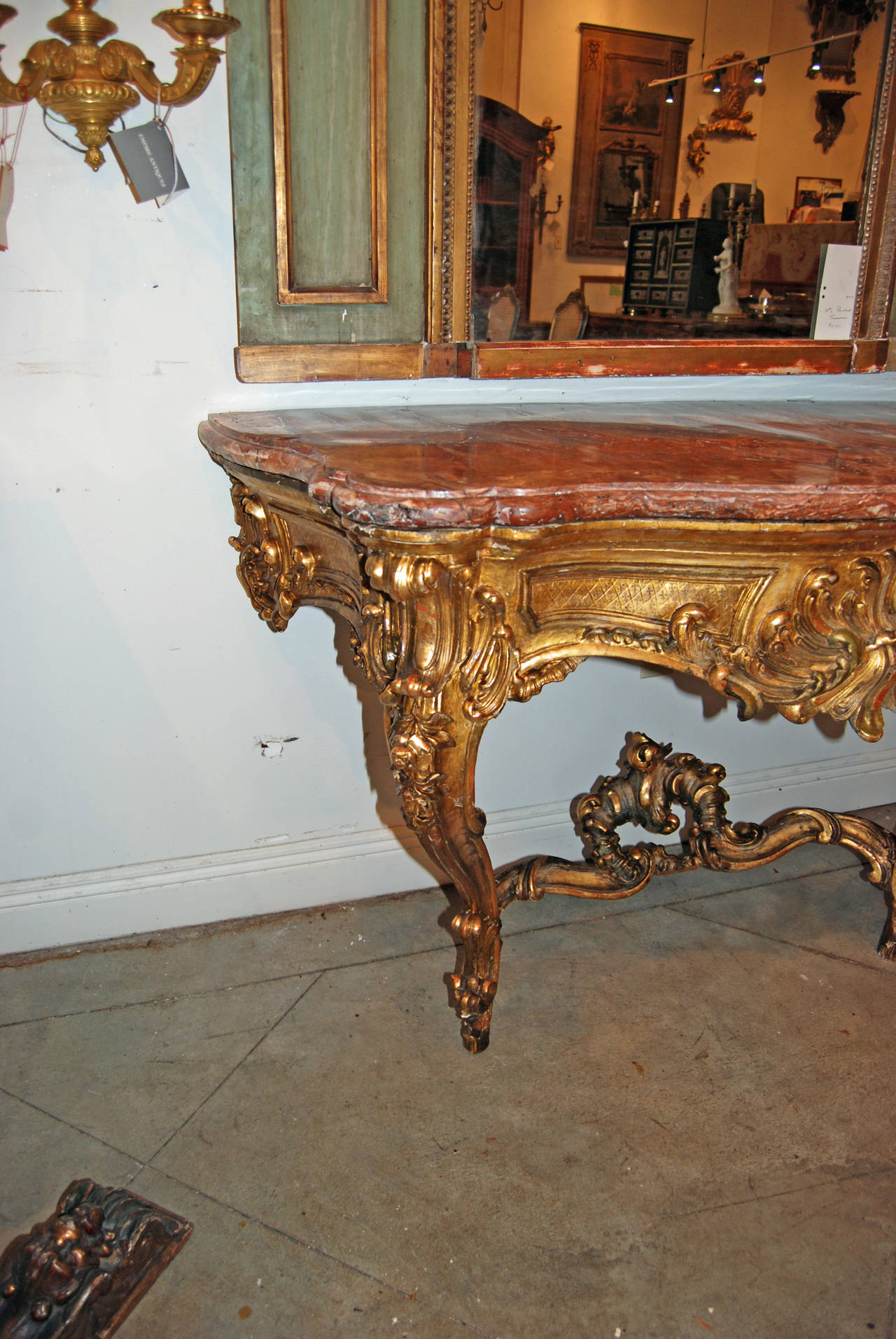Louis XV giltwood console with original Rosetta marble.