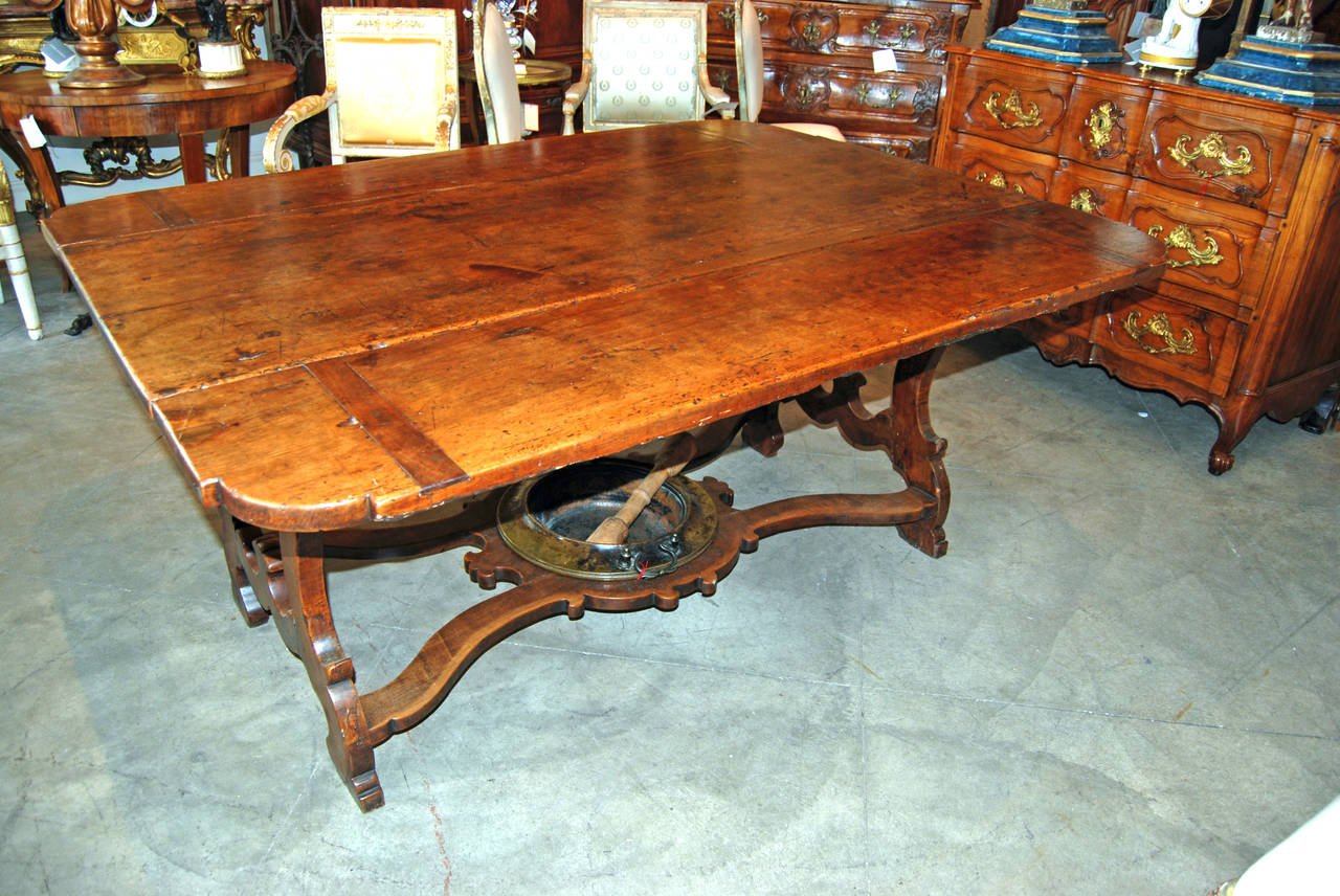 Exceptional 17th century Tuscan walnut table with original iron coal brazier.