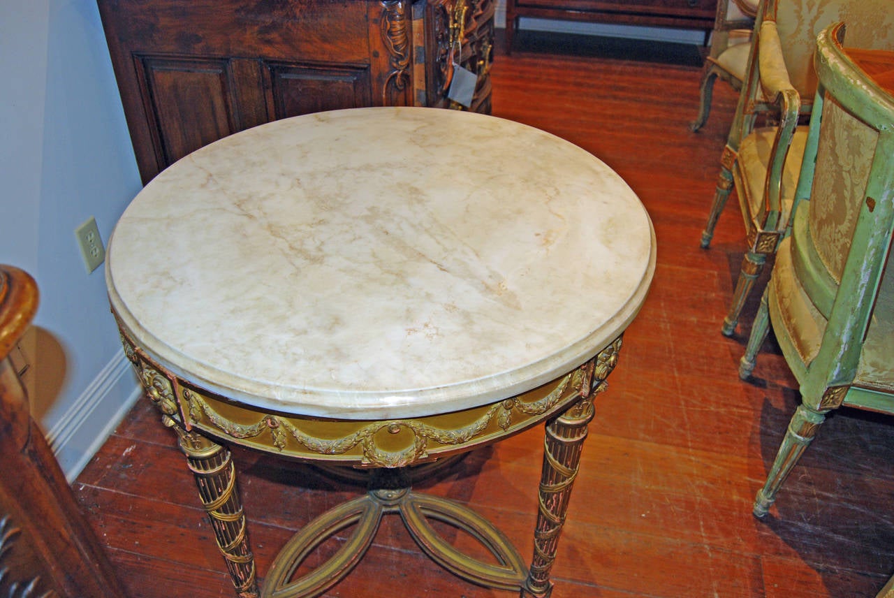 19th century carved and gilded center table.