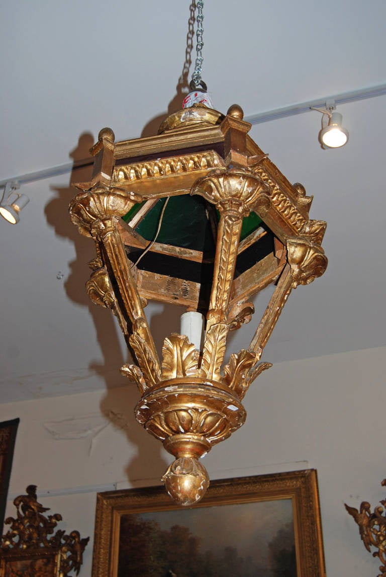 Carved and gilded wood lantern.