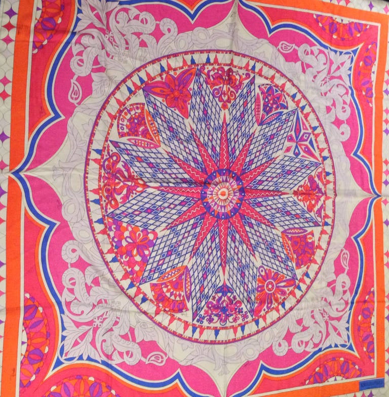 Pucci oversized patterned silk scarf in bright pink, orange, purple and cobalt blue in distinctive starburst pattern. New with tags, measures 52” square and can be worn as a shawl. Made in Italy, with hand-rolled edges. Retails for $795...IF you can