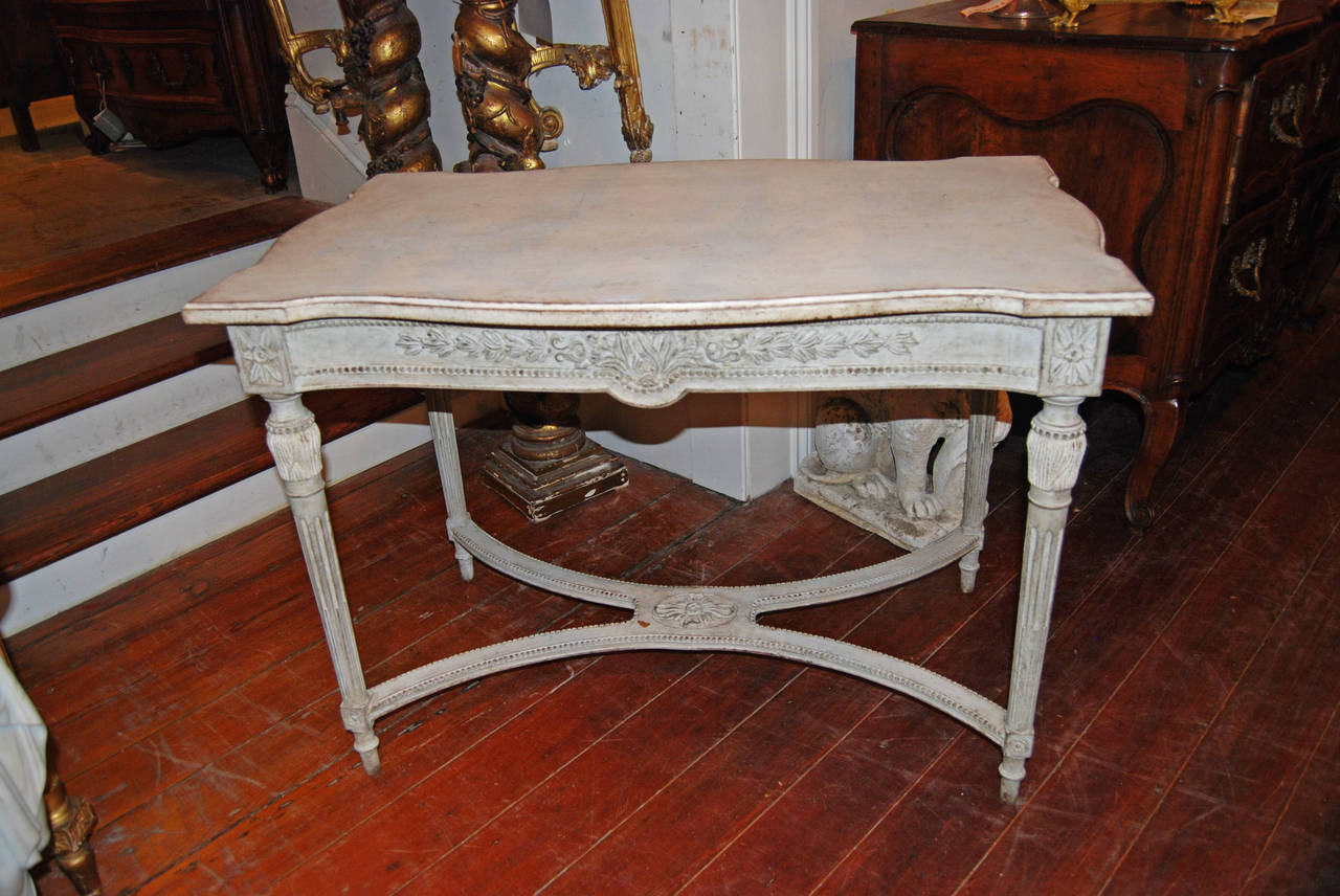 Lovely painted and carved center table.