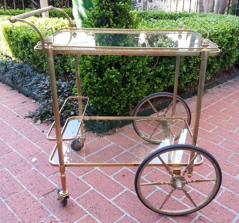 Beautiful brass 1960s Maison Baguès serving cart with gallery tray top.
Price Reduced: $2500!!!
