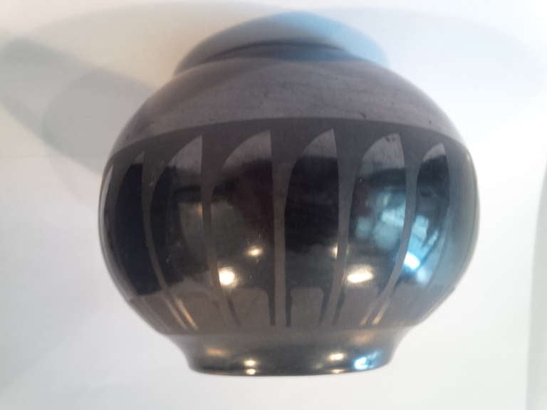 San Illdefonso Blackware vase by Pueblo Pottery artist Maria Martinez (1887-1980).  Base marked 