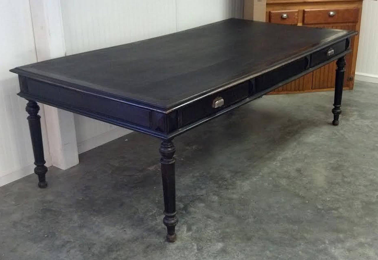 Amazing 19th century 91 in long, leather top library table that would make an excellent dining table. With two deep drawers on both sides this would make an impressive partners desk as well. Found in a Hudson Valley Estate the dark patina on this
