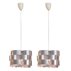 Pair of Max Sauze Metal Light Fixtures