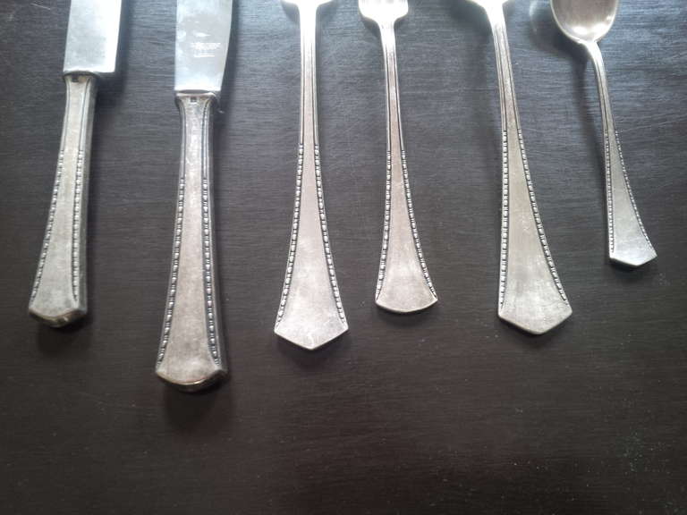 Rare set of silverplate flatware made by Otto Kaltenbach (OKA) for Rostfrei Solingen.  Altensteig, Germany, circa 1950.  Signed.  Six plate settings, each consisting of six pieces (Dinner knife, Place butter knife, Tablespoon, Teaspoon, Dinner fork,