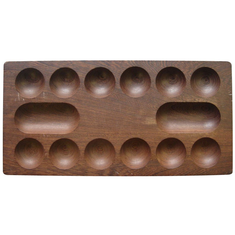 Wenge wood game board by Skodje Skern. Denmark, circa 1960. 

Game board made from a solid piece of wood, designed for playing 