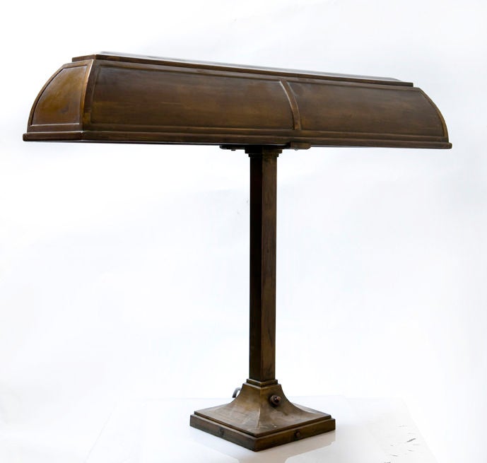 Bronze bankers lamp by I.P. Frink.  USA, circa 1920.<br />
<br />
On/off switch on base. Fully rewired.<br />
<br />
Dimensions:<br />
20 inches tall<br />
24 inch wide shade<br />
5.5 inch square base