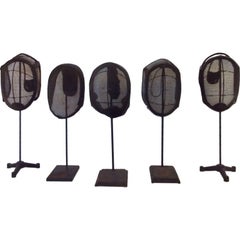 Set of 5 Used Fencing Masks on Metal Stands