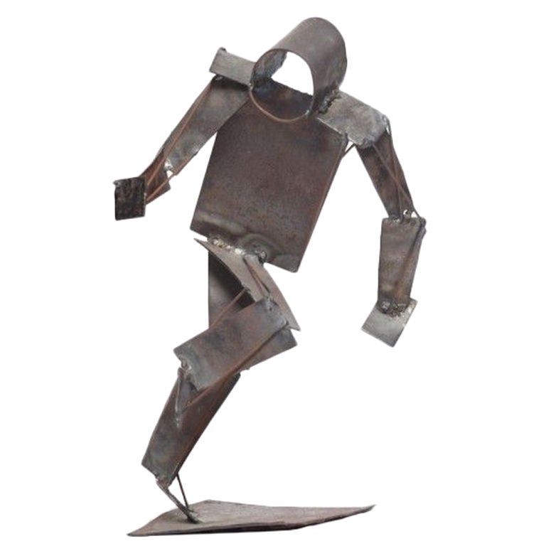 Brutalist Sculpture of Man in Motion