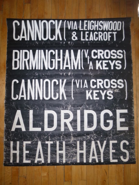 Vintage bus sign from England.  Circa 1950.  White text on black canvas. Includes the following stops: Cannock, Birmingham, Aldride and Heath Hayes.  Ready to hang or frame.