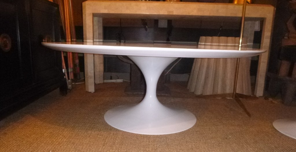 Tulip coffee table by Saarinen for Knoll.  USA, cira 1960 to 1970.  

Signed with early Knoll red/white label. 

Features a 36 inch round top in matte white laminate with matte white cast iron base.