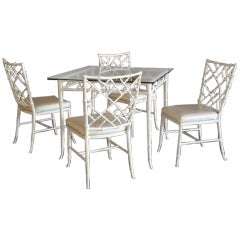 Aluminum dining set with four chairs by Phyllis Morris.