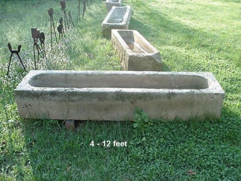 Antique stone trough from the Pennsylvania-Ohio border. Several available. Process old individually.  Each is hand-carved from various colored varieties of sandstone, granite, gniess and bluestone.  USA, circa 1800.

Ideal for use as planters and