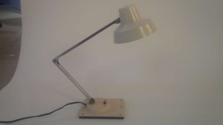 Task lamp by Tensor in bone white with stainless steel arm.  USA, circa 1960.
